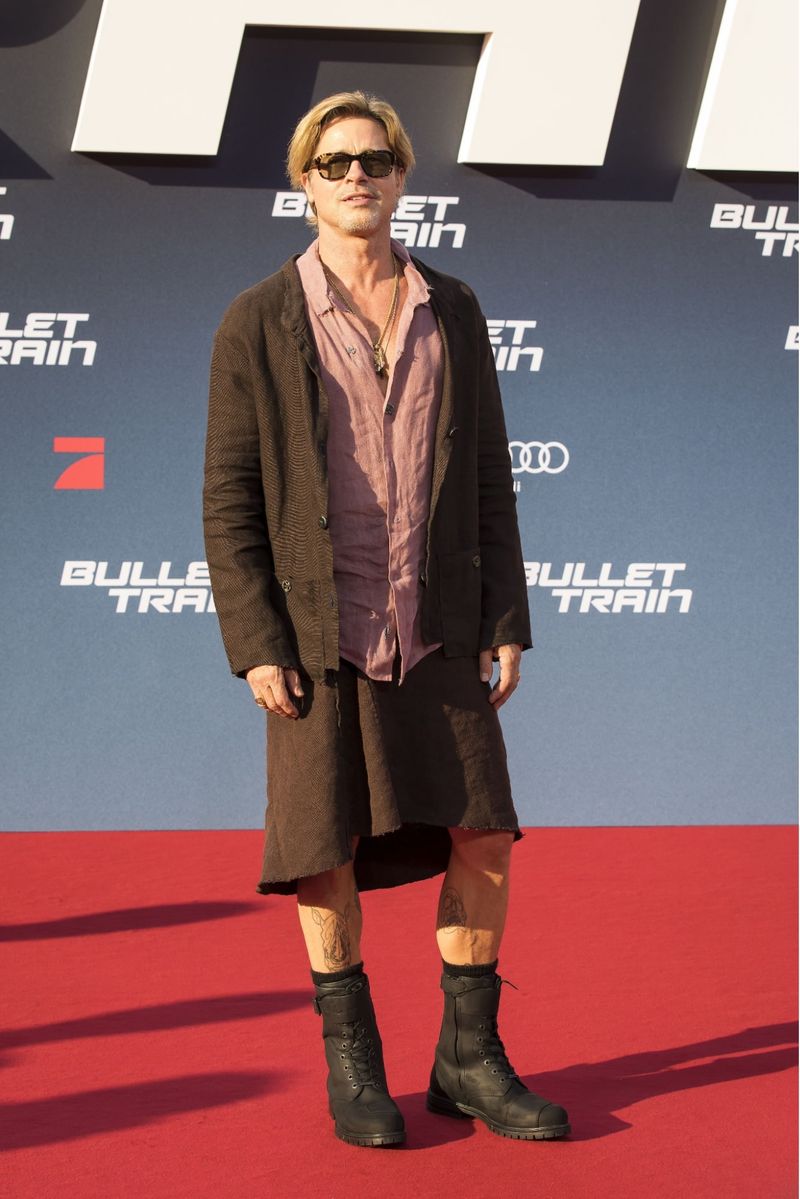 Brad Pitt in a matching skirt and blazer 