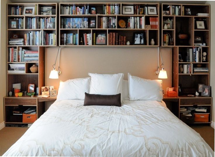 bookshelf headboard above bed